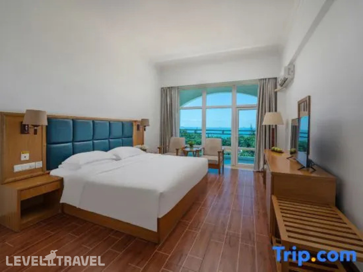 фотографии номера Делюкс с видом на море отеля Huayuan Hotspring Seaview Hotel Sanya в Китай(Санья) - фото №1
