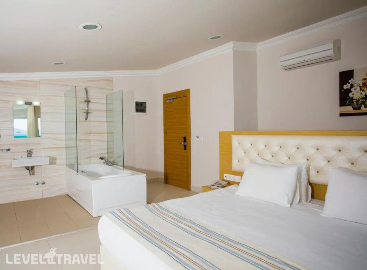 фотографии номера Люкс с балконом и видом на море отеля Dragut Point North Hotel в Турция(Тургутреис) - фото №2