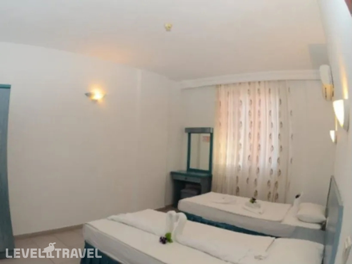фотографии номера Экономичный (две односпальные кровати) отеля Sun Vera Hotel (Ex.Fun Point Apart Hotel) в Турция(Аланья - центр) - фото №1