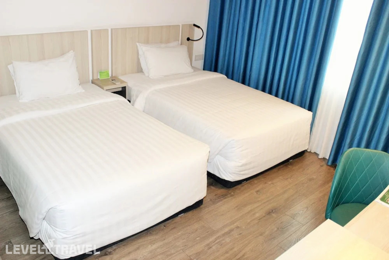 фотографии номера Делюкс (две односпальные кровати) отеля Liberty Hotel Saigon Greenview в Вьетнам(Хошимин (Сайгон)) - фото №10