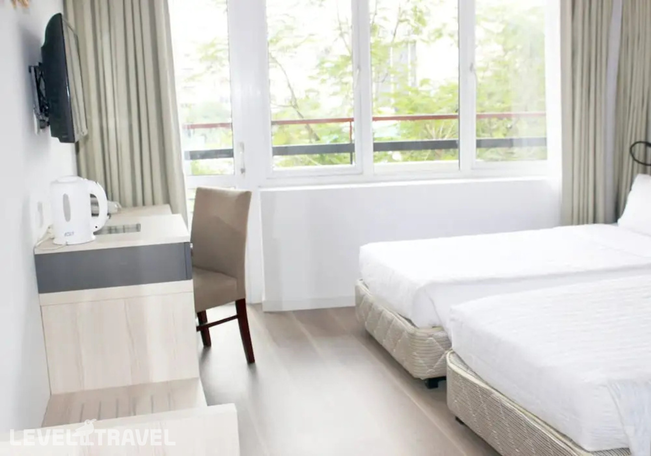 фотографии номера Делюкс (две односпальные кровати) отеля Liberty Hotel Saigon Greenview в Вьетнам(Хошимин (Сайгон)) - фото №5