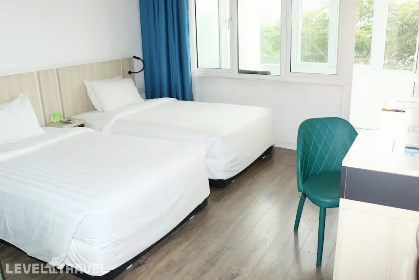 фотографии номера Делюкс (две односпальные кровати) отеля Liberty Hotel Saigon Greenview в Вьетнам(Хошимин (Сайгон)) - фото №18