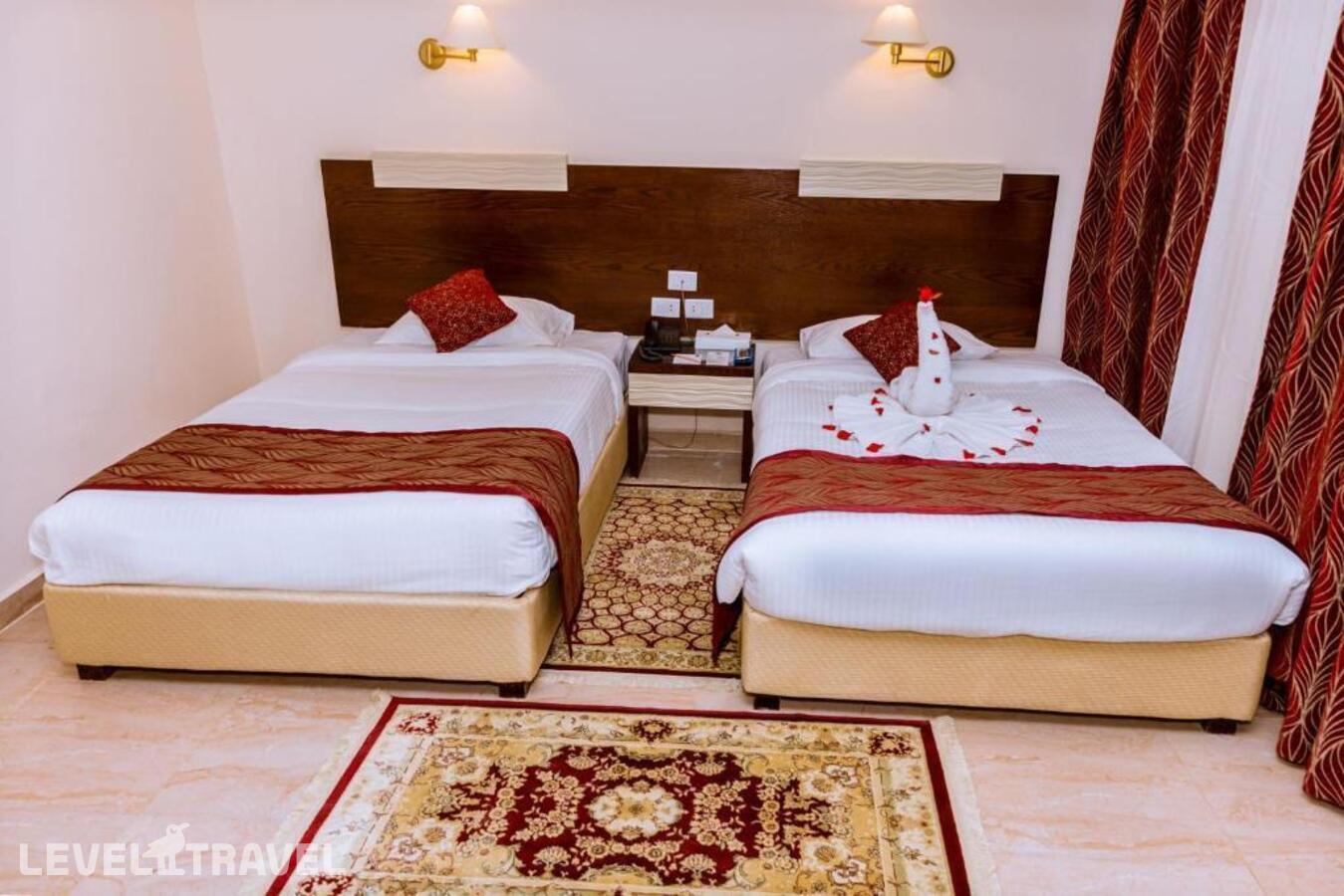 фотографии номера Делюкс с видом на сад отеля Golden Beach Resort (Ex. Movie Gate Hurghada) в Египет(Хургада (город)) - фото №2