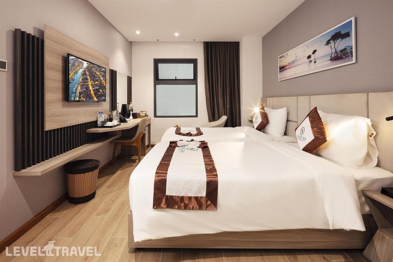 фотографии номера Улучшенный (две односпальные кровати) отеля Nalicas Hotel в Вьетнам(Нячанг) - фото №3