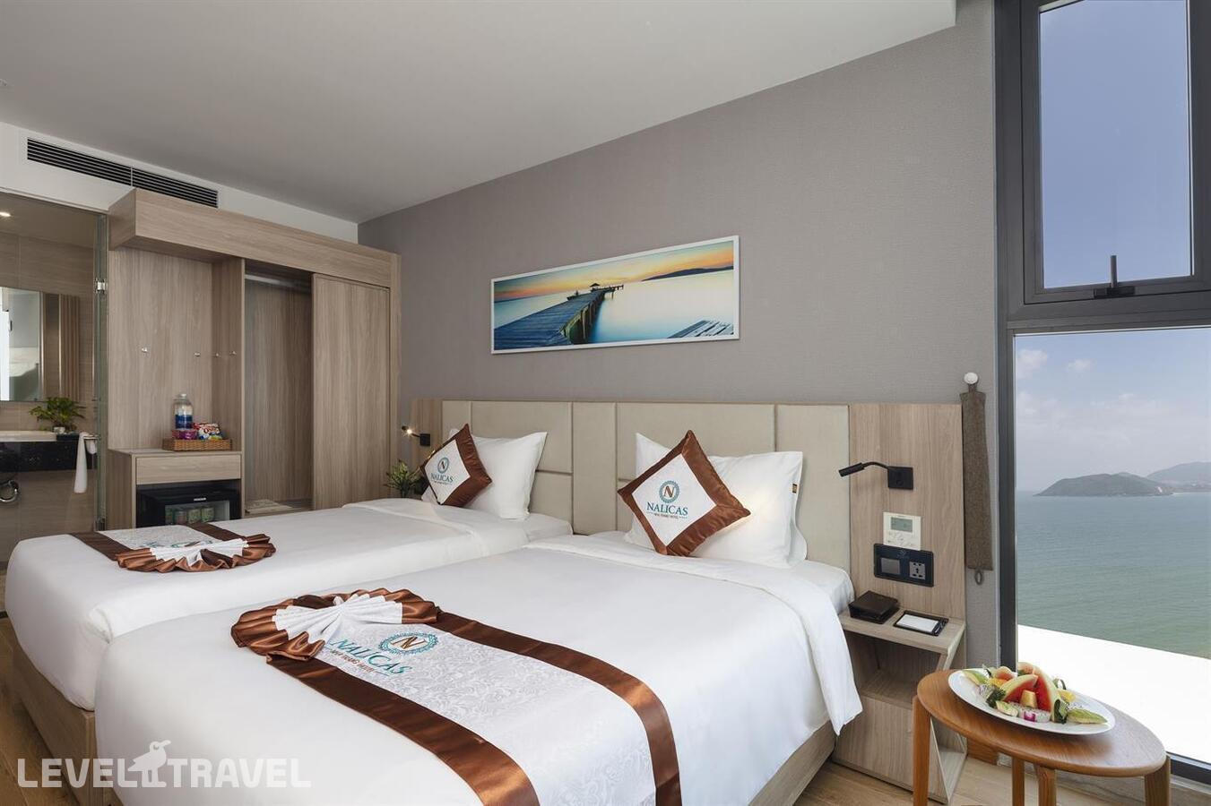 фотографии номера Делюкс с частичным видом на море отеля Nalicas Hotel в Вьетнам(Нячанг) - фото №1