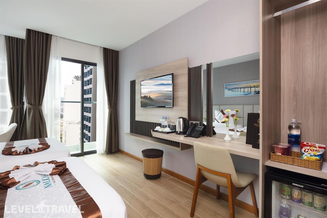 фотографии номера Делюкс Senior с частичным видом на море отеля Nalicas Hotel в Вьетнам(Нячанг) - фото №2