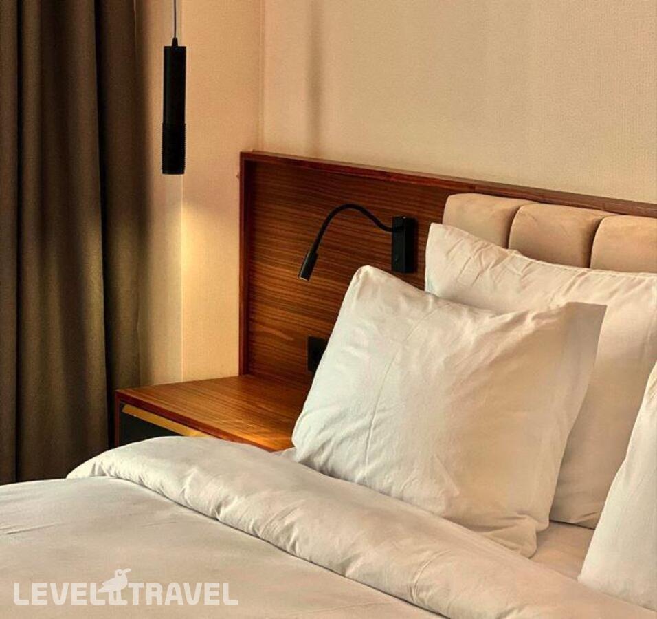 фотографии номера Стандартный с видом на бассейн отеля Отель Riviera Hotel в Абхазия(Сухум) - фото №4