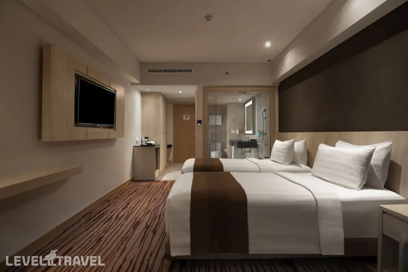 фотографии номера Делюкс (две односпальные кровати) отеля Sovereign Bali в Индонезия(Кута) - фото №2