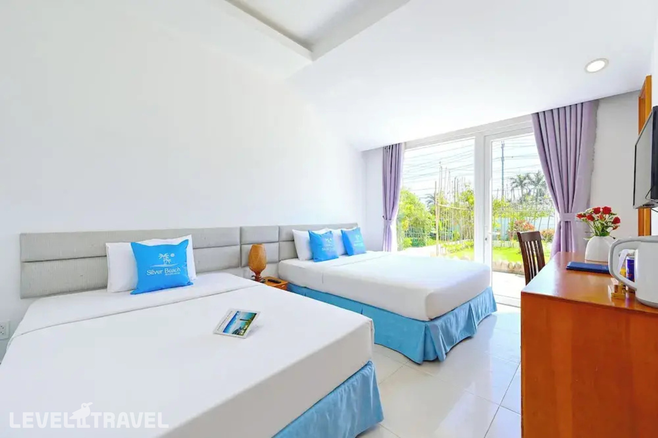 фотографии номера Трехместный делюкс отеля Ttc Resort Premium - Ke Ga в Вьетнам(Ке Га) - фото №2