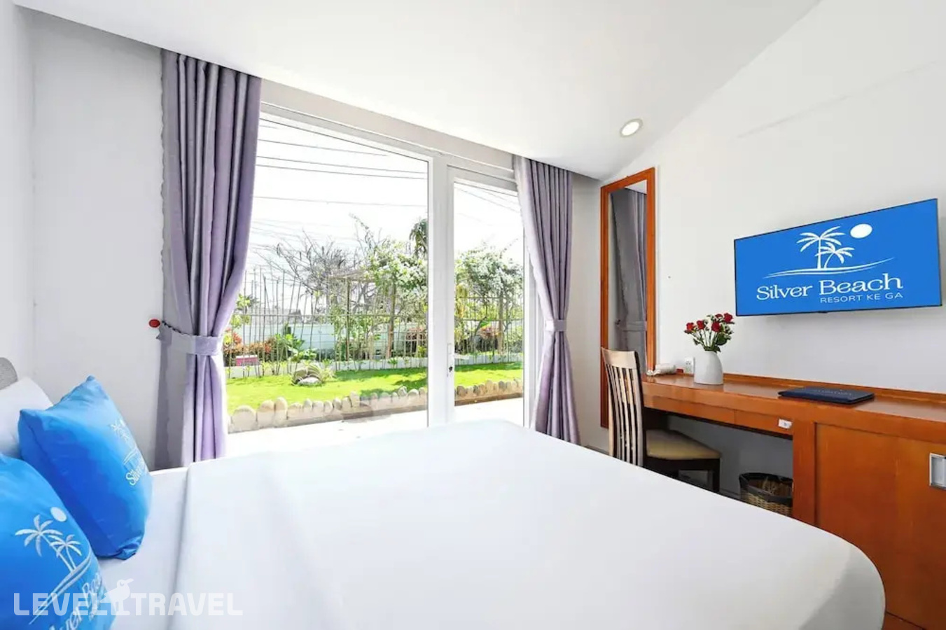 фотографии номера Трехместный делюкс отеля Ttc Resort Premium - Ke Ga в Вьетнам(Ке Га) - фото №1