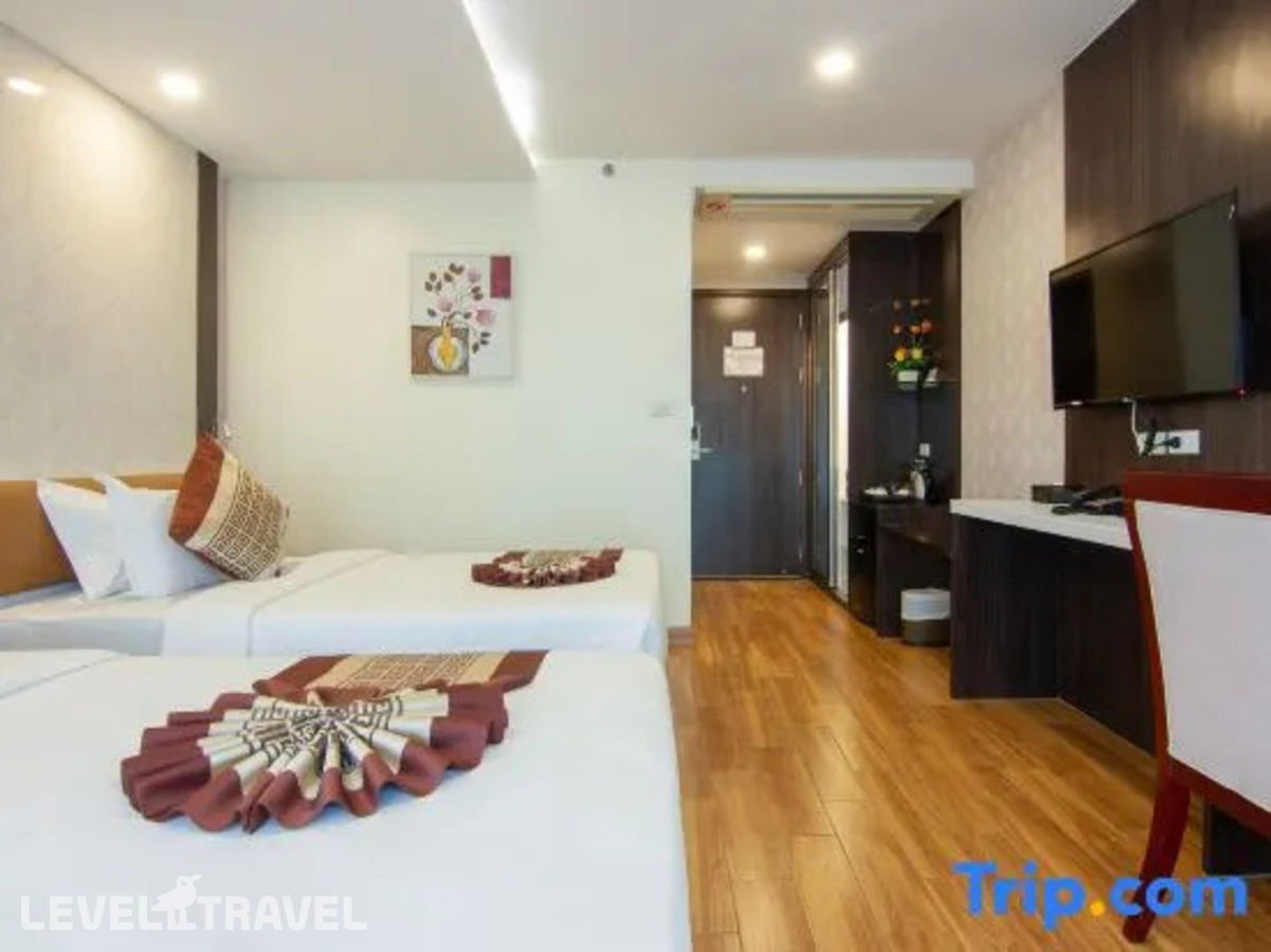 фотографии номера Делюкс (две односпальные кровати) отеля Golden Jomtien Beach Hotel в Таиланд(Джомтьен) - фото №1