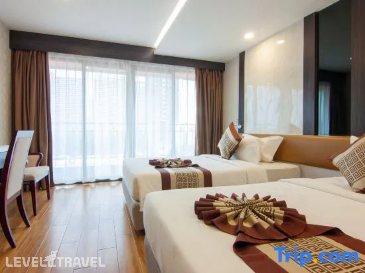 фотографии номера Делюкс (две односпальные кровати) отеля Golden Jomtien Beach Hotel в Таиланд(Джомтьен) - фото №3