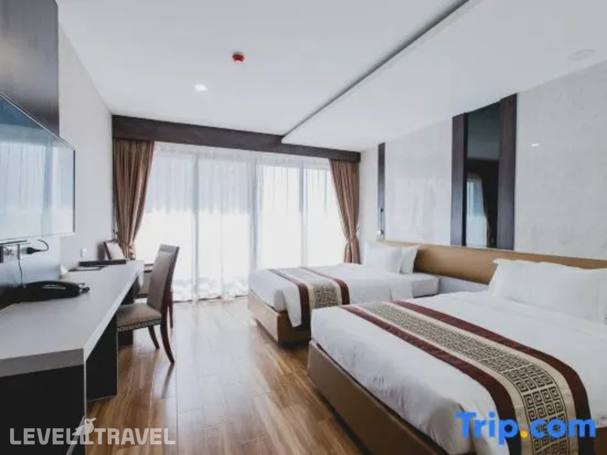 фотографии номера Делюкс (две односпальные кровати) отеля Golden Jomtien Beach Hotel в Таиланд(Джомтьен) - фото №6