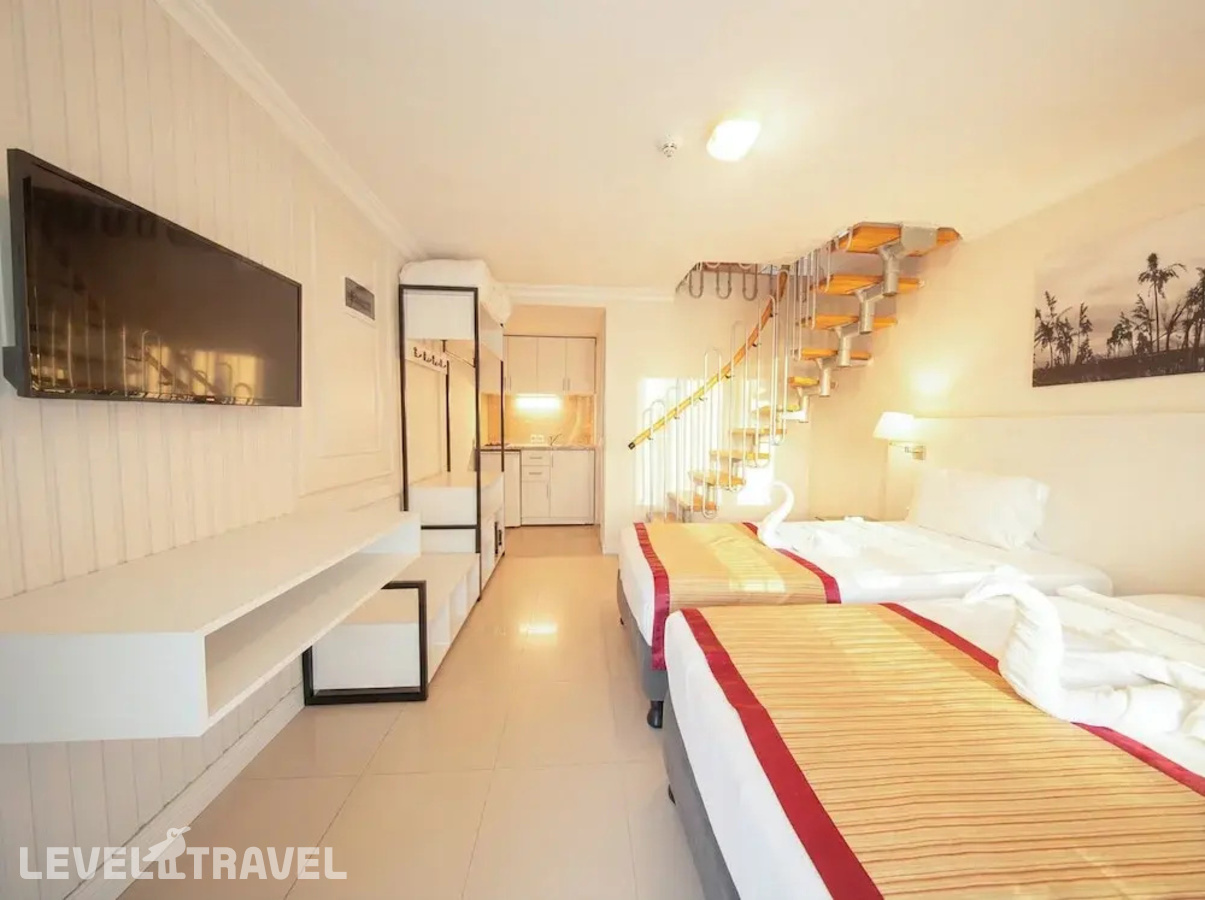 фотографии номера Семейный номер Standard Дуплекс отеля Tropic On The Beach Hotel в Турция(Сиде - центр) - фото №1