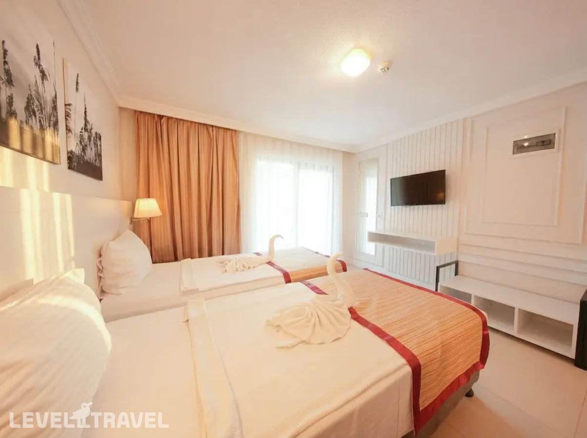 фотографии номера Семейный номер Standard Дуплекс отеля Tropic On The Beach Hotel в Турция(Сиде - центр) - фото №2