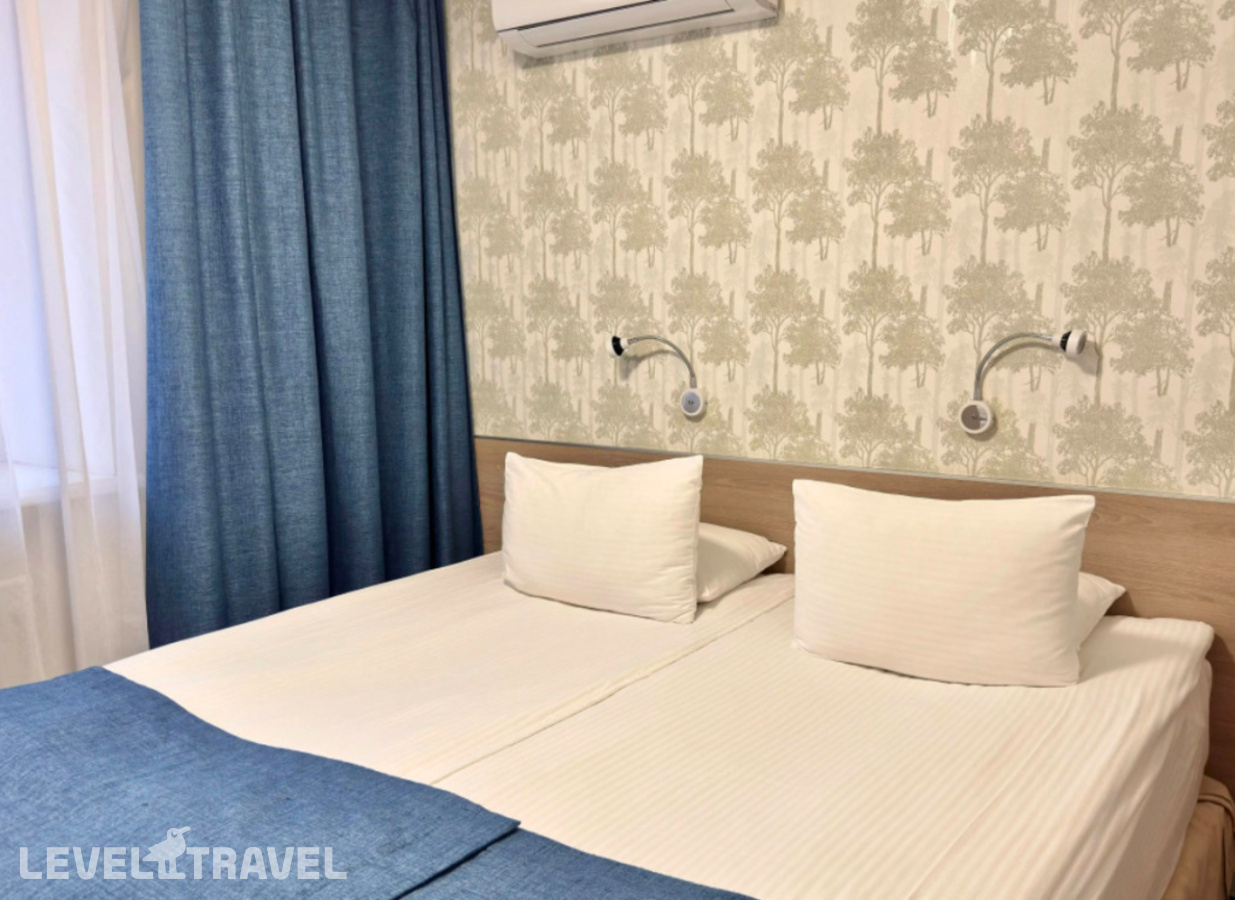 фотографии номера Стандартный (две односпальные кровати) отеля Tyumen Time Hotel в Россия(Тюмень) - фото №4