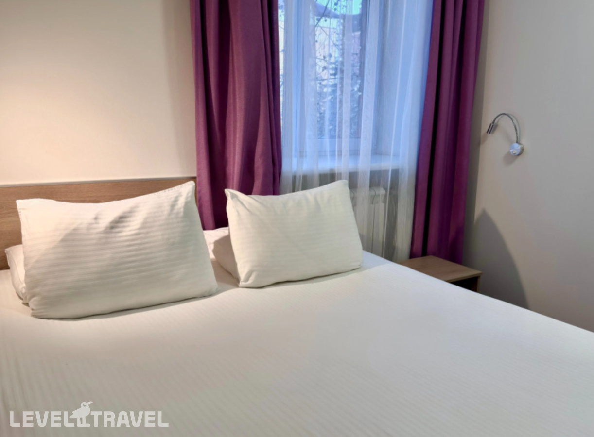 фотографии номера Стандартный (две односпальные кровати) отеля Tyumen Time Hotel в Россия(Тюмень) - фото №7