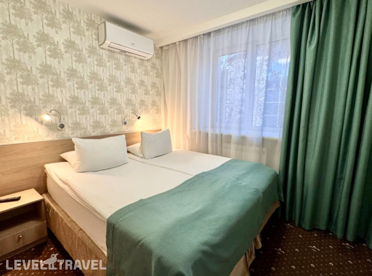 фотографии номера Стандартный (две односпальные кровати) отеля Tyumen Time Hotel в Россия(Тюмень) - фото №1