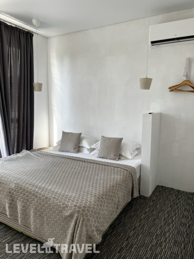 фотографии номера Апартаменты с балконом (2 комнаты) отеля Higos Hotel в Абхазия(Алахадзы) - фото №1