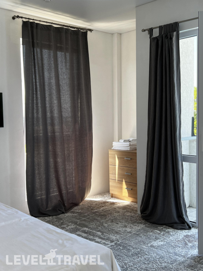 фотографии номера Апартаменты с балконом (2 комнаты) отеля Higos Hotel в Абхазия(Алахадзы) - фото №3