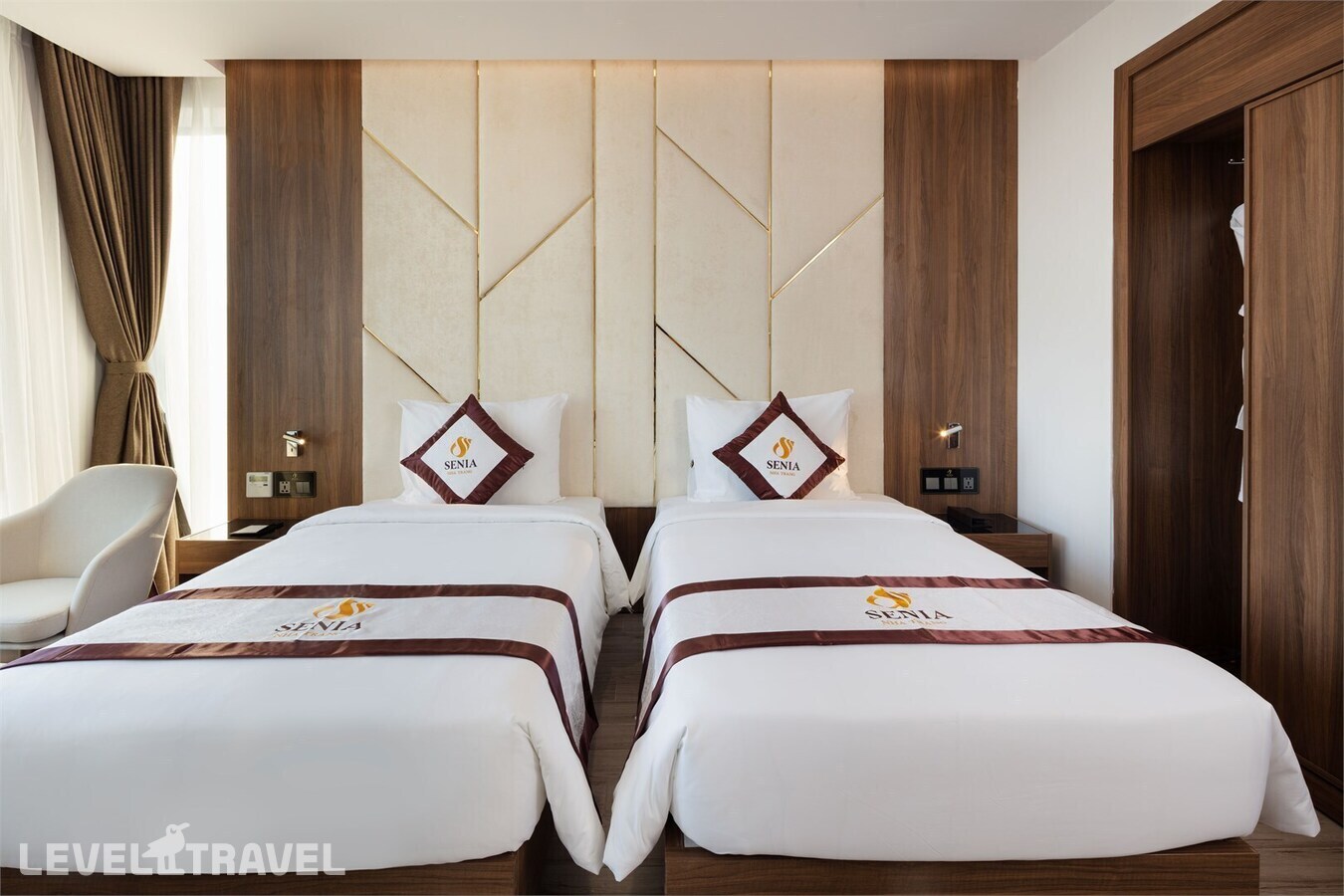 фотографии номера Делюкс с частичным видом на море отеля Senia Hotel в Вьетнам(Нячанг) - фото №4