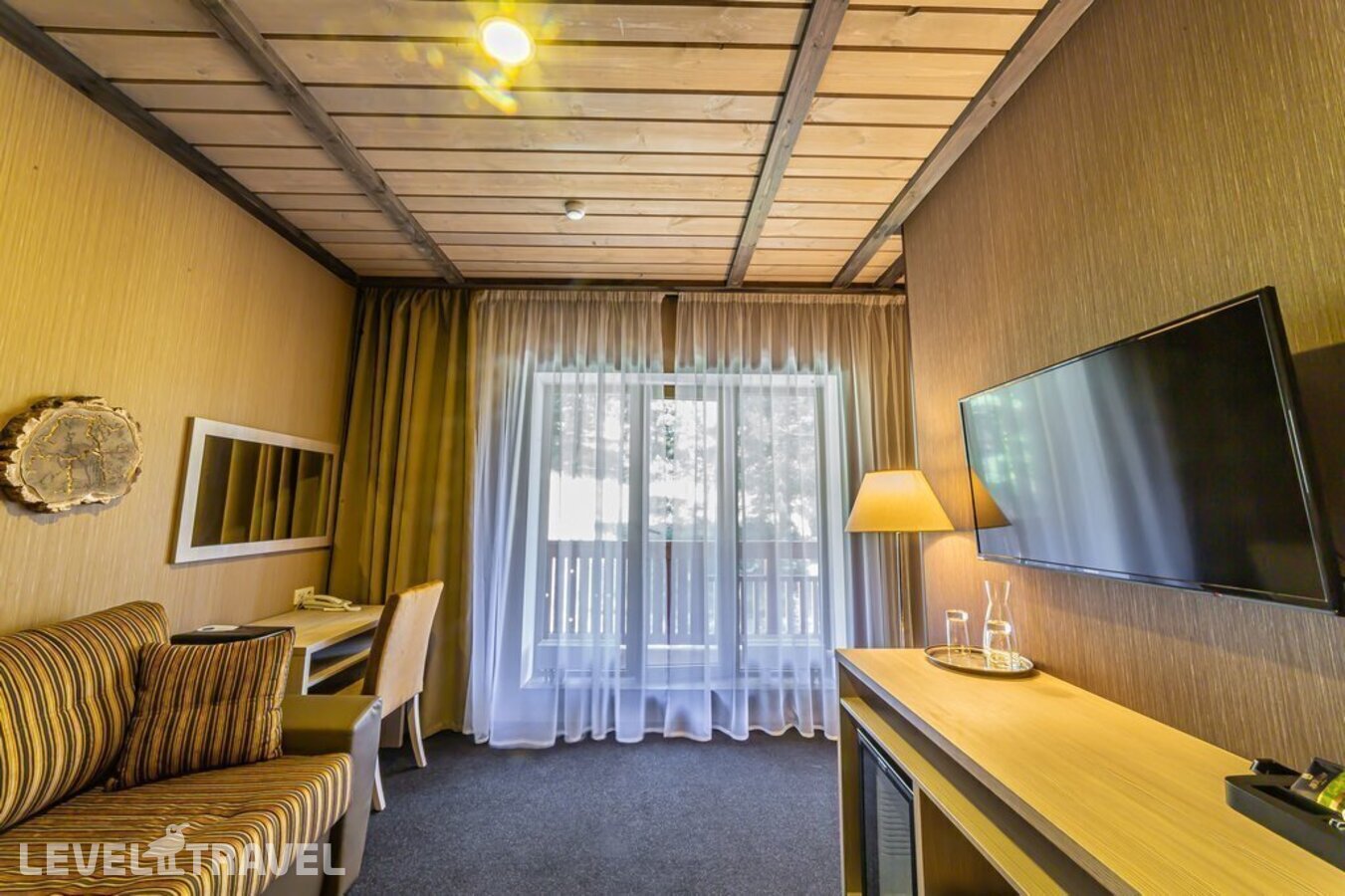 фотографии номера Делюкс премиум отеля Arkhyz Royal Resort & Spa в Россия(Архыз) - фото №1