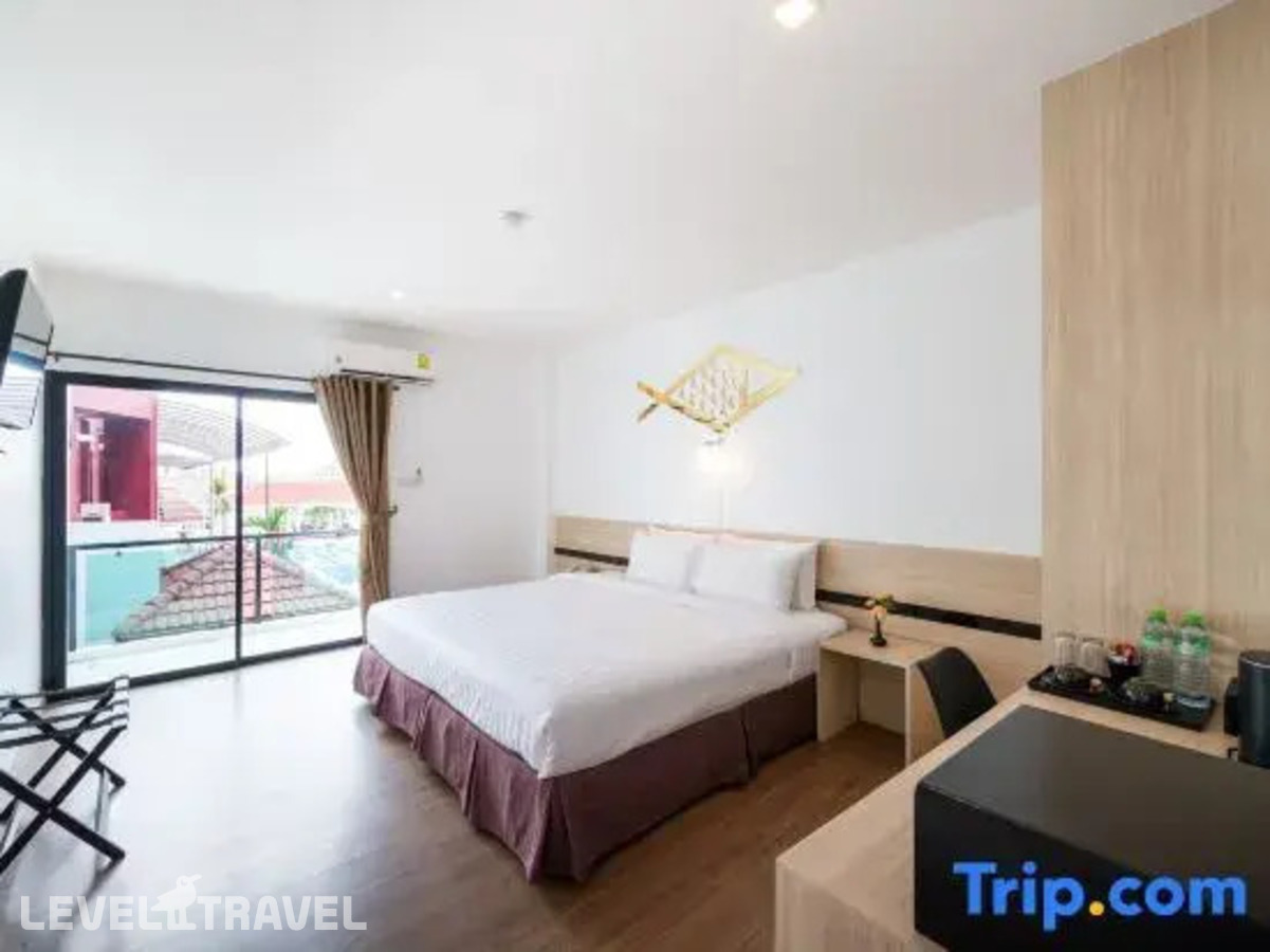 фотографии номера Делюкс с видом на бассейн отеля Arawana Regency North Pattaya в Таиланд(Наклуа) - фото №5