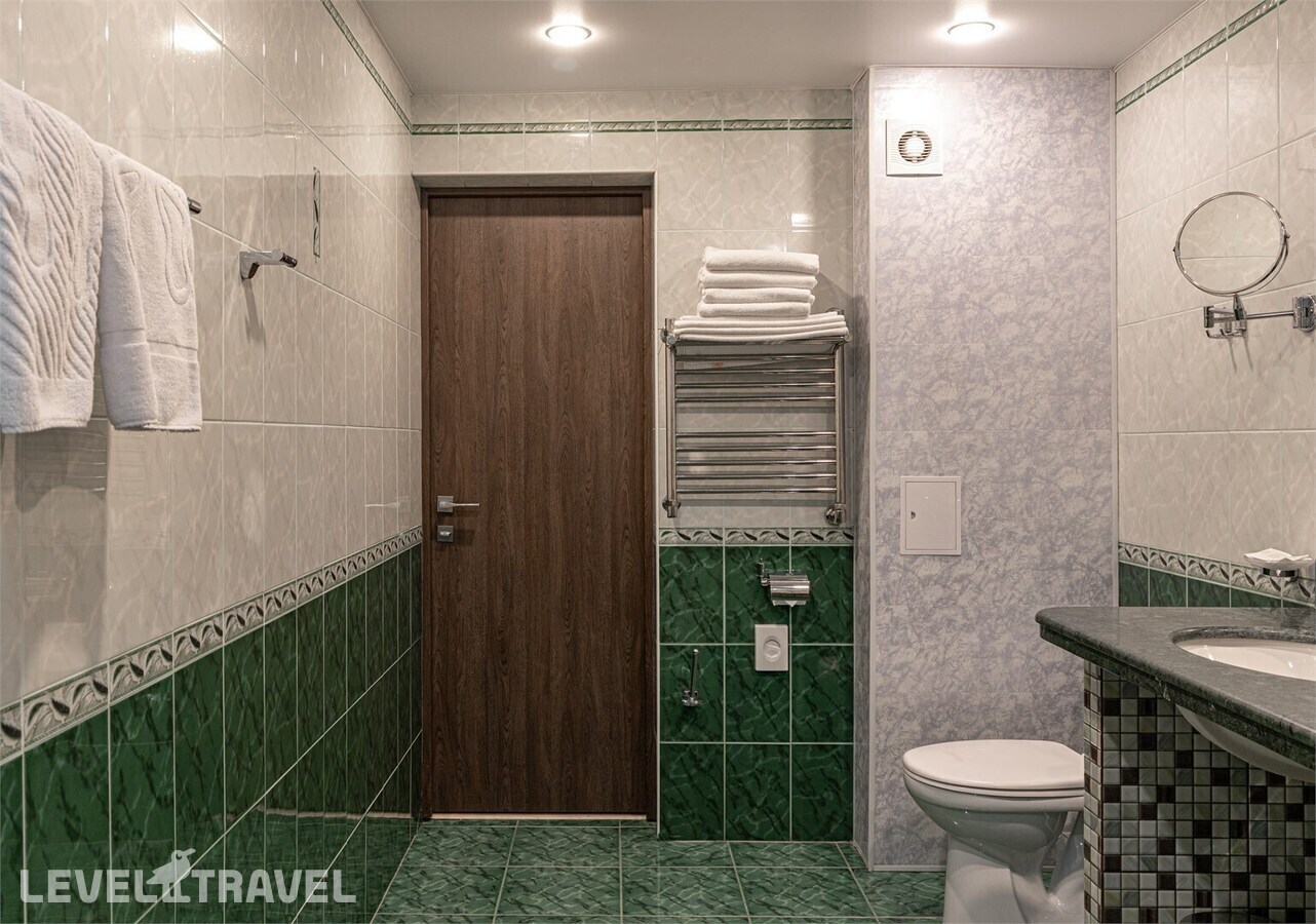 фотографии номера Стандартный с 2 комнатами и террасой (корпус Б) отеля Экодом Адлер в Россия(Адлер) - фото №12