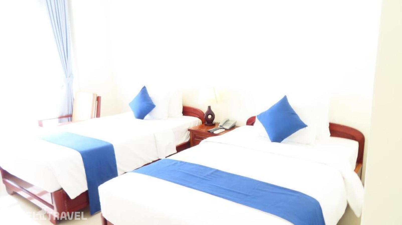 фотографии номера Улучшенный (две односпальные кровати) отеля Navy Hotel Cam Ranh в Вьетнам(Камрань) - фото №1