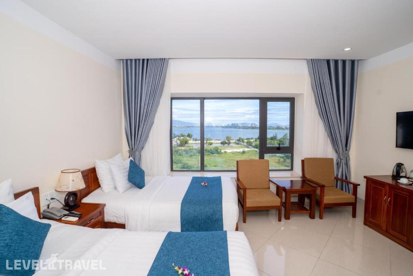 фотографии номера Делюкс (две односпальные кровати) отеля Navy Hotel Cam Ranh в Вьетнам(Камрань) - фото №3