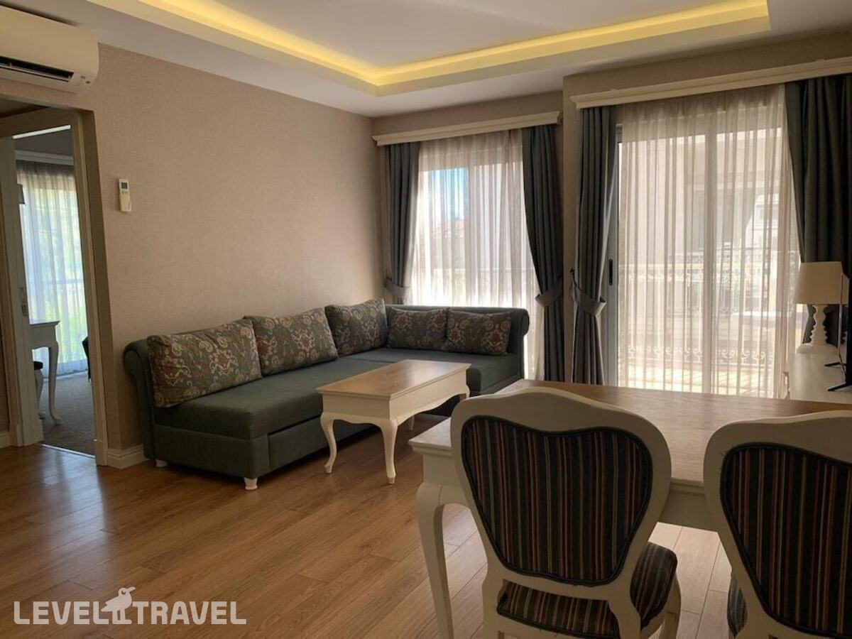 фотографии номера Семейный с видом на сад (2 спальни) отеля Daphne Residence в Турция(Фетхие) - фото №1