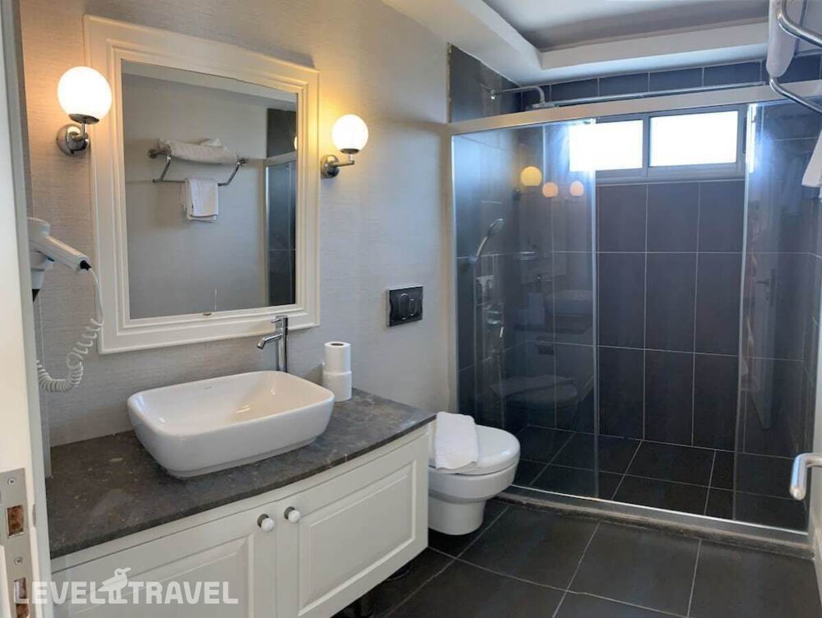 фотографии номера Семейный с видом на сад (2 спальни) отеля Daphne Residence в Турция(Фетхие) - фото №8