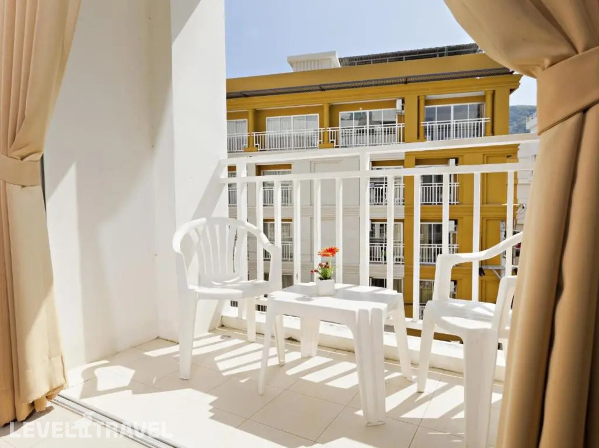 фотографии номера Четырехместный с балконом отеля Garden Phuket Hotel в Таиланд(Патонг Бич) - фото №2