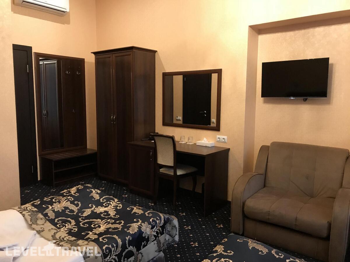 фотографии номера Стандартный номер отеля Отель Сапфир в Россия(Центральный район) - фото №11