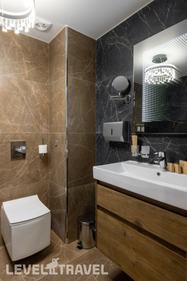 фотографии номера Делюкс с балконом (две односпальные кровати) отеля Stellar Collection Chalet hotel в Россия(Эсто-Садок) - фото №7
