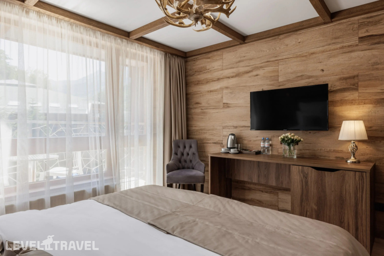 фотографии номера Делюкс с балконом (две односпальные кровати) отеля Stellar Collection Chalet hotel в Россия(Эсто-Садок) - фото №3