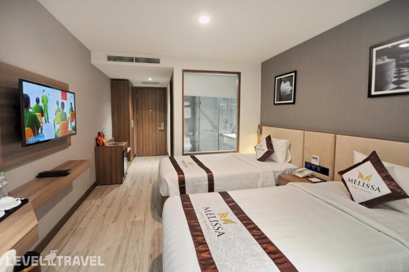 фотографии номера Делюкс (две односпальные кровати) отеля Melissa Hotel в Вьетнам(Нячанг) - фото №4