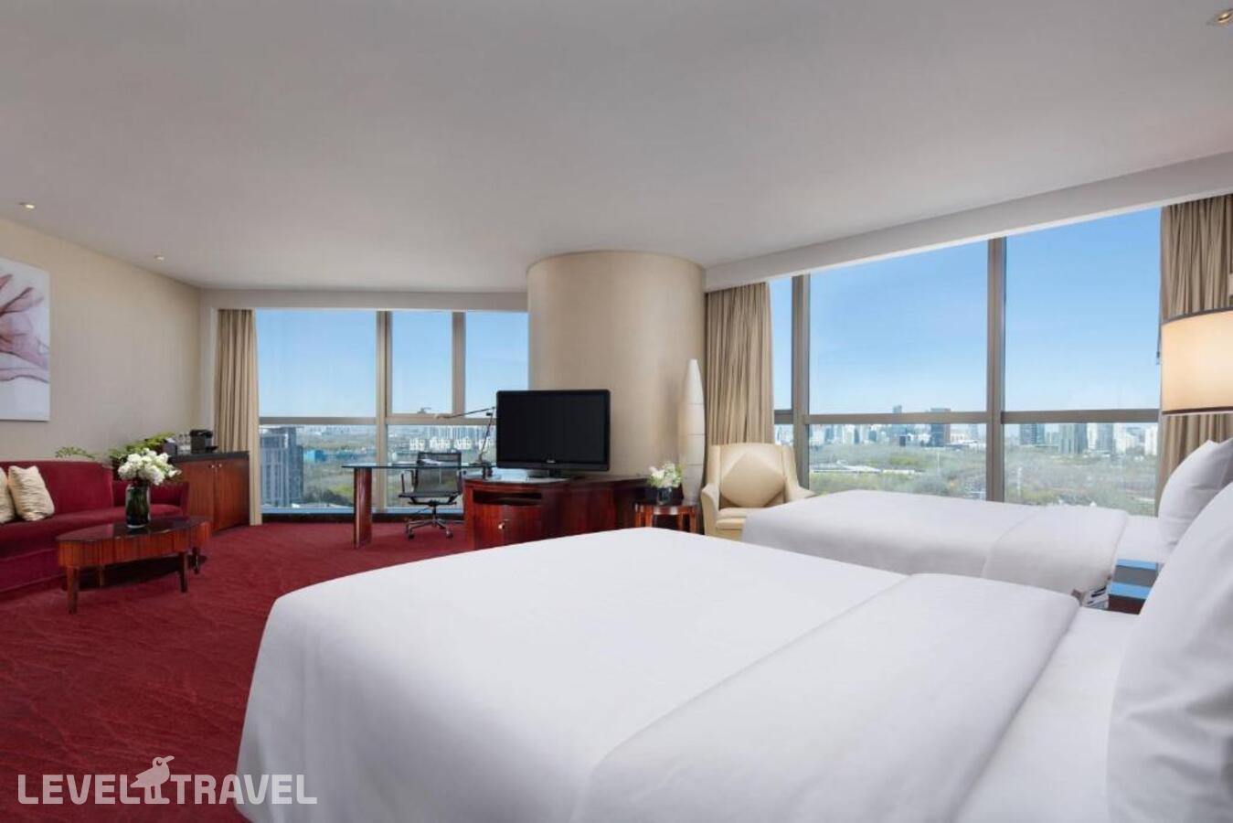 фотографии номера Представительская студия отеля Beijing Marriott Hotel Northeast в Китай(Пекин) - фото №1