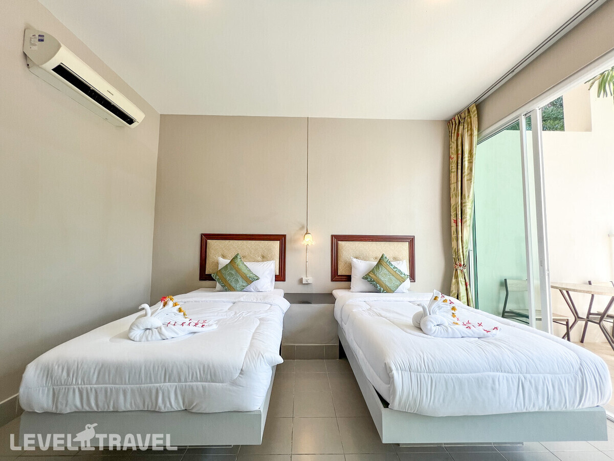 фотографии номера Делюкс отеля Tris Miracle Kata Beach Side в Таиланд(Ката Бич) - фото №1