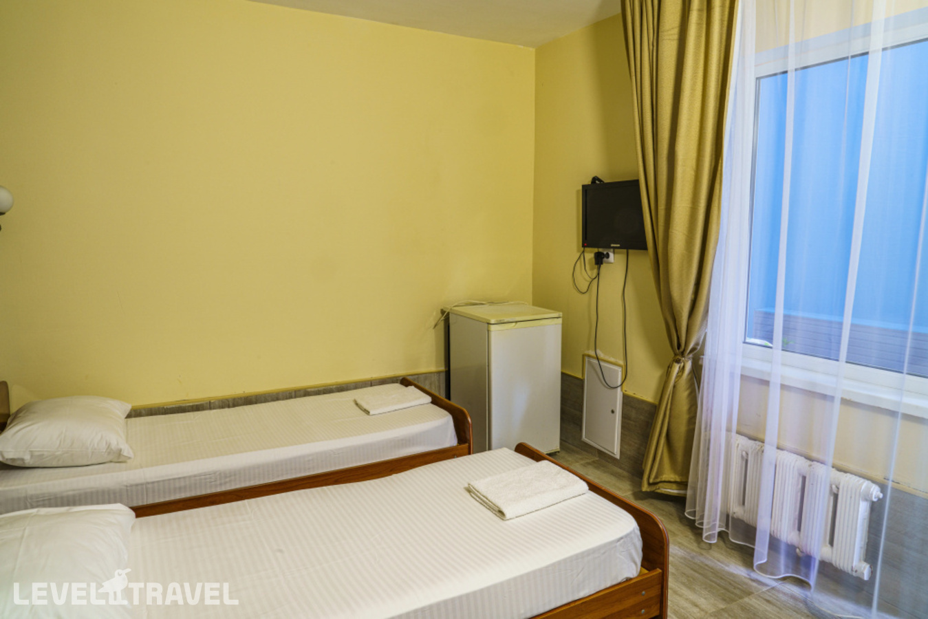 фотографии номера Стандартный (две односпальные кровати) отеля Optima Guest House в Россия(Адлер) - фото №2