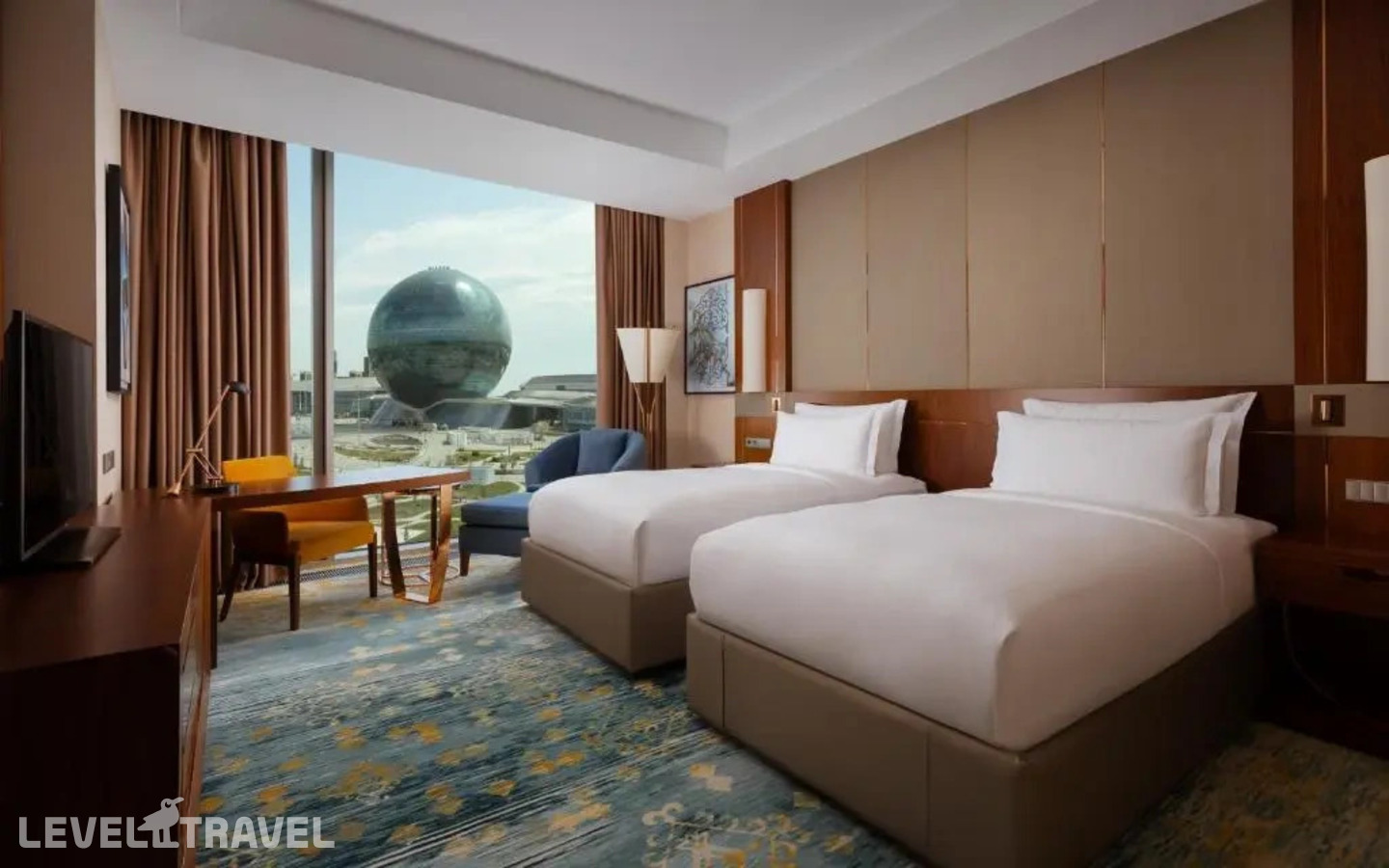 фотографии номера Двухместный номер Expo View Deluxe (2 отдельные кровати) отеля Hilton Astana в Казахстан(Астана) - фото №1
