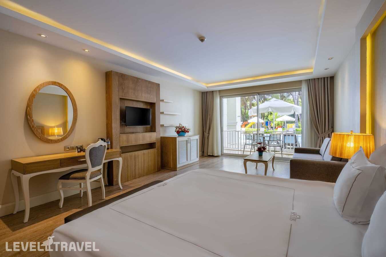 фотографии номера Семейный номер Jasmine с видом на бассейн отеля Bellis Deluxe Hotel в Турция(Кадрие) - фото №7