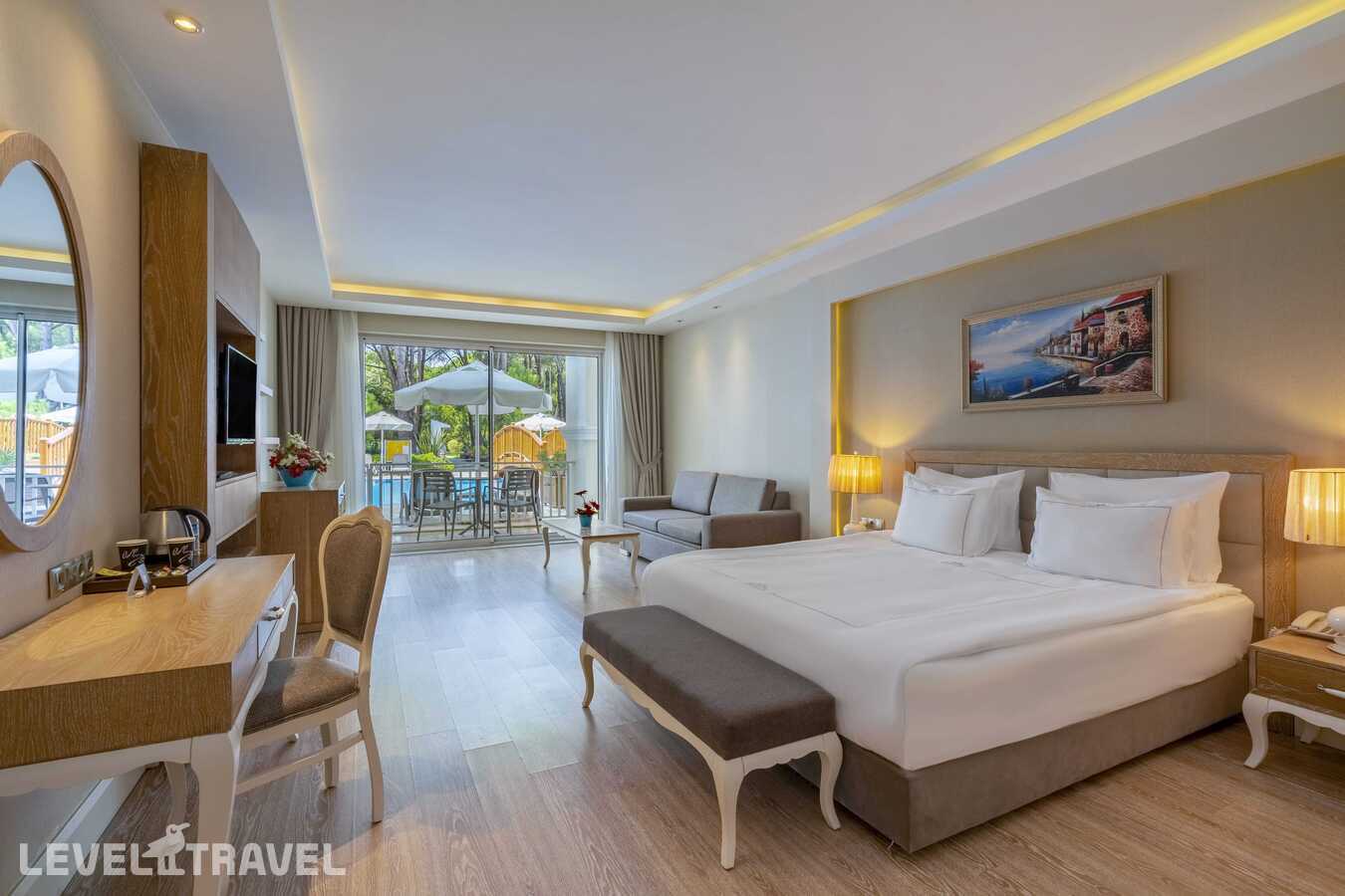 фотографии номера Семейный номер Jasmine с видом на бассейн отеля Bellis Deluxe Hotel в Турция(Кадрие) - фото №4