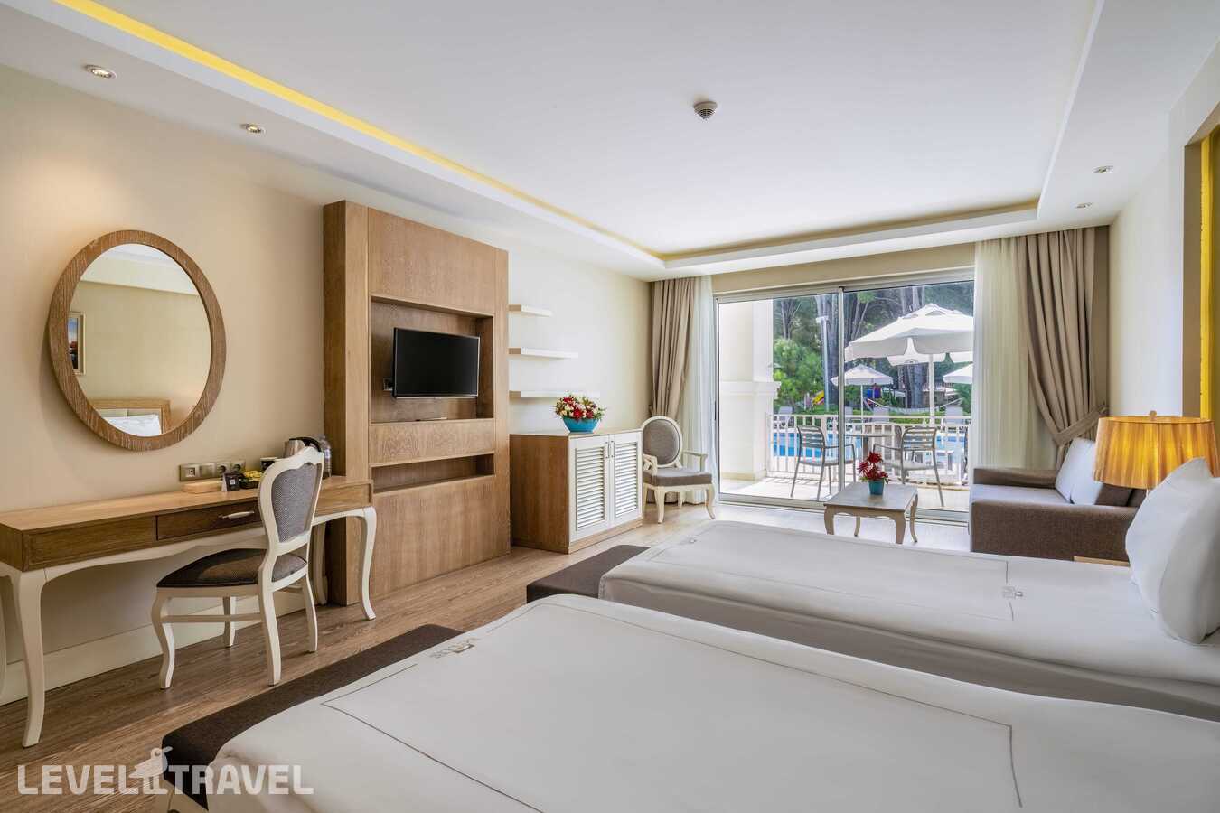 фотографии номера Семейный номер Jasmine с видом на бассейн отеля Bellis Deluxe Hotel в Турция(Кадрие) - фото №3