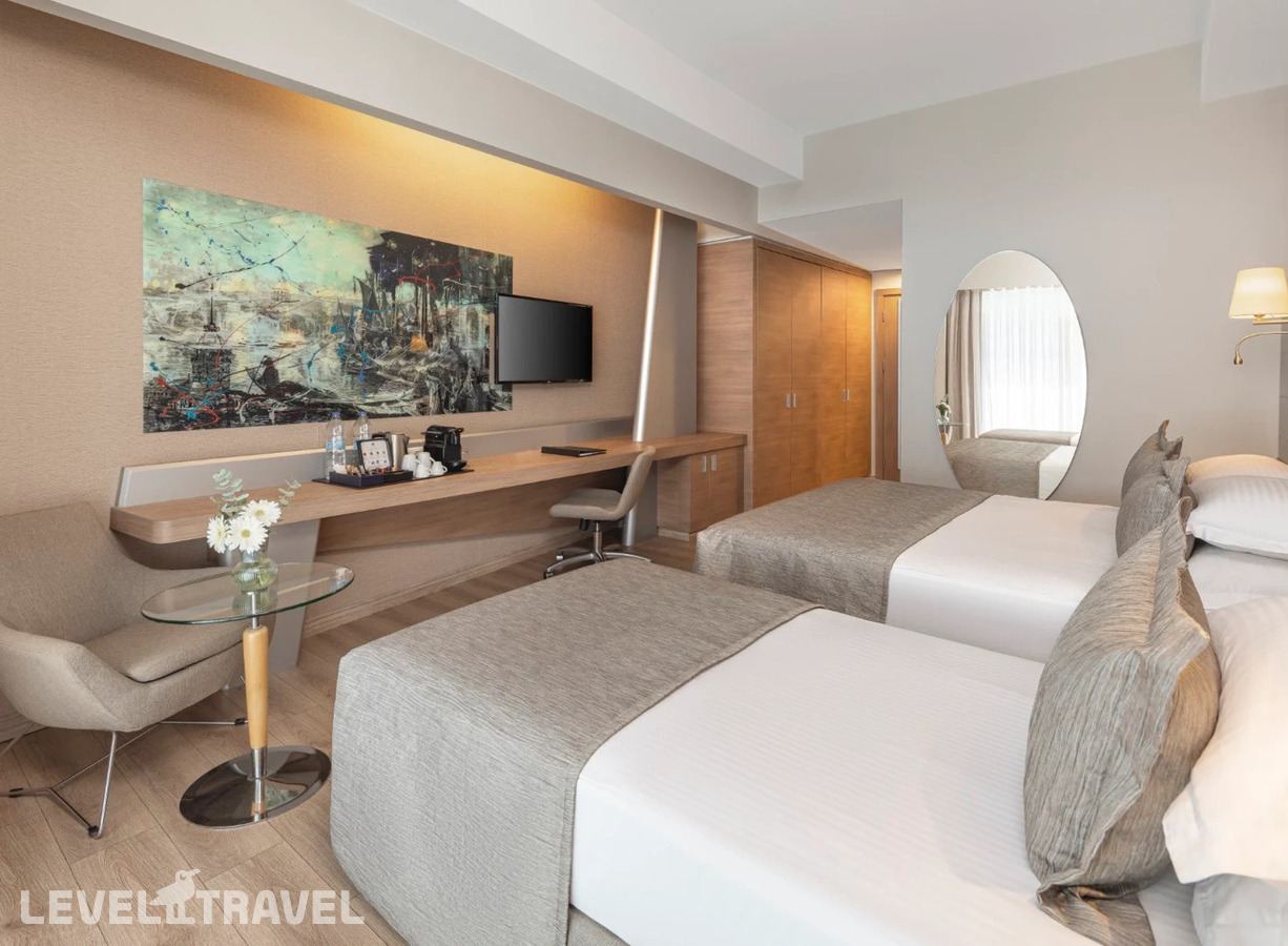 фотографии номера Делюкс (две односпальные кровати) отеля Concorde Deluxe Resort в Турция(Лара) - фото №1