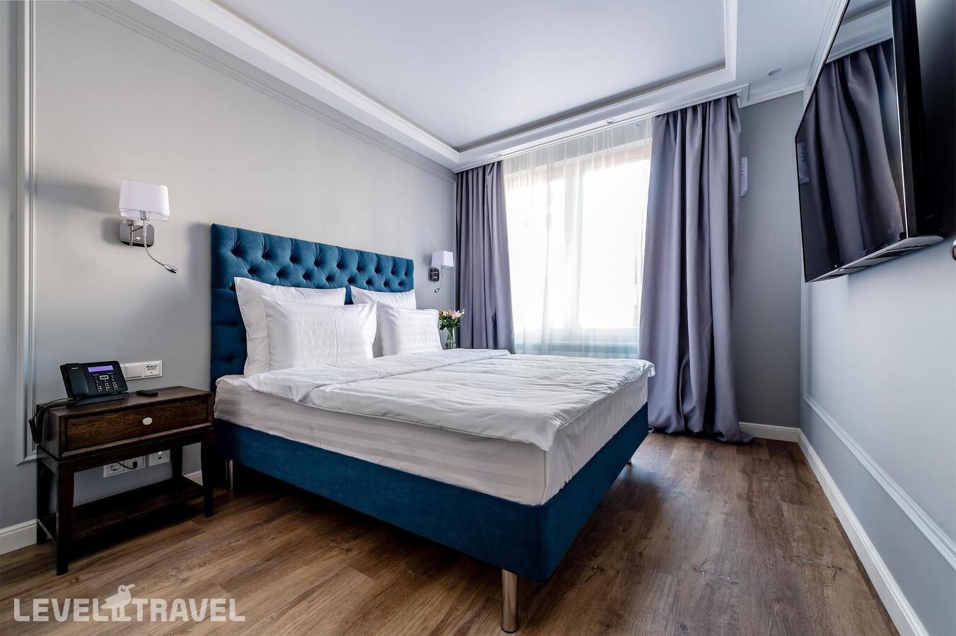 фотографии номера Апартаменты люкс (2 комнаты) отеля Dionis Art Apartments в Россия(Центральный район) - фото №8