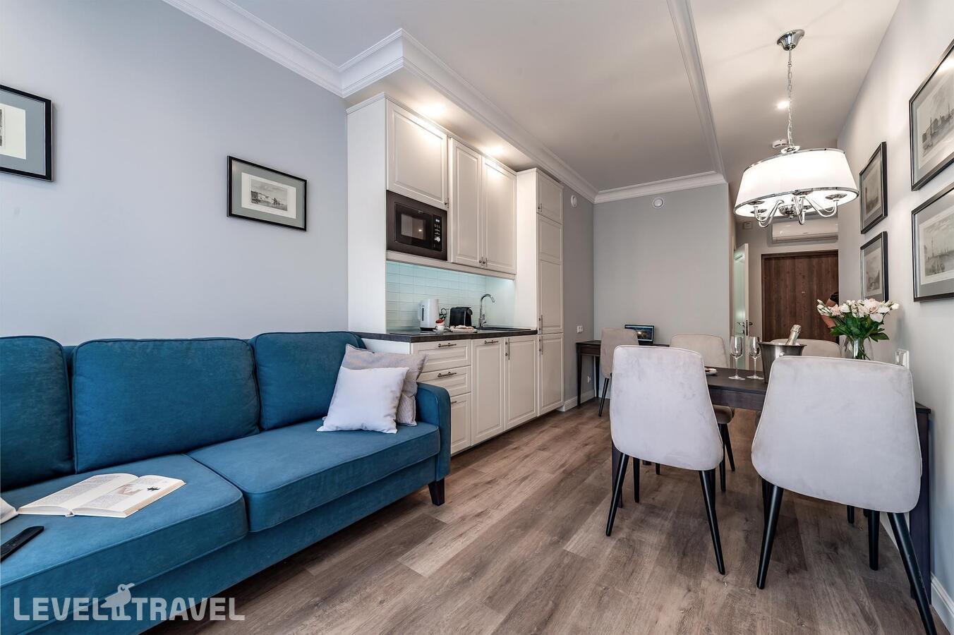 фотографии номера Апартаменты люкс (2 комнаты) отеля Dionis Art Apartments в Россия(Центральный район) - фото №1