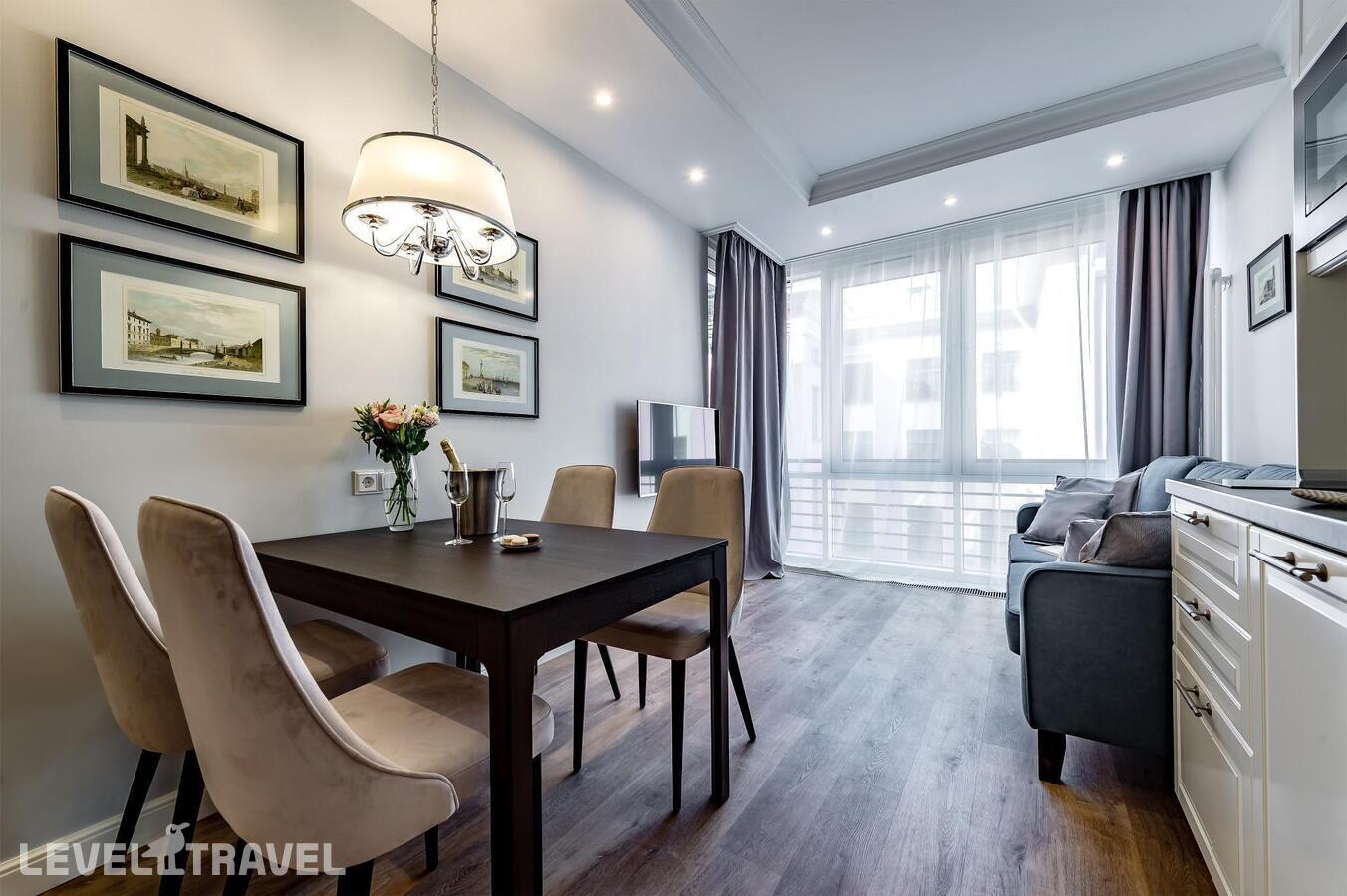 фотографии номера Апартаменты люкс (2 комнаты) отеля Dionis Art Apartments в Россия(Центральный район) - фото №2
