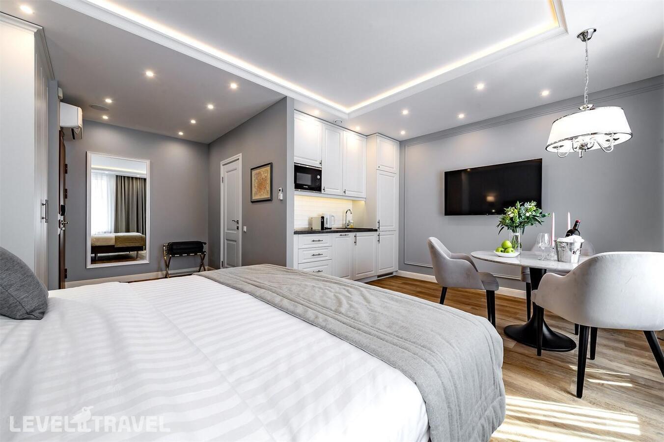 фотографии номера Улучшенные апартаменты отеля Dionis Art Apartments в Россия(Центральный район) - фото №2