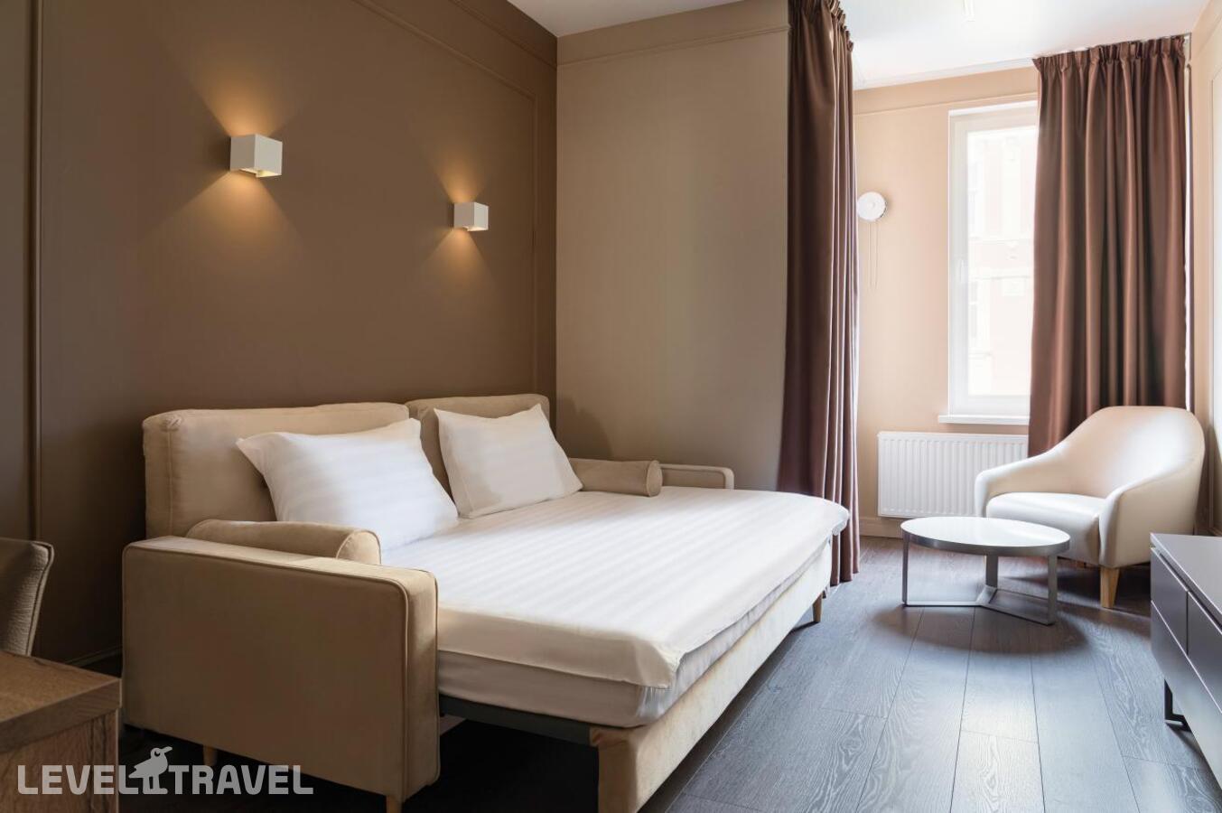 фотографии номера Улучшенные апартаменты (3 комнаты) отеля Dionis Art Apartments в Россия(Центральный район) - фото №2